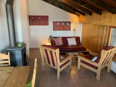 Ein Sitzbereich in der Unterkunft Apartment Alps View -Mont Rouge Veysonnaz