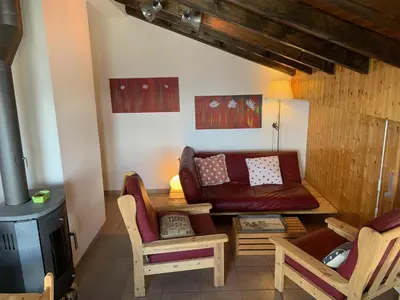 Ein Sitzbereich in der Unterkunft Apartment Alps View -Mont Rouge Veysonnaz