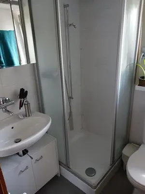 Ein Badezimmer in der Unterkunft Urgemütliche Ferienwohnung, zentral und doch ruhig