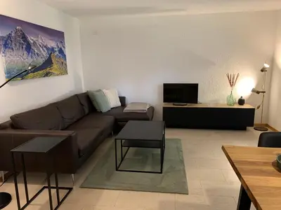 Ein Sitzbereich in der Unterkunft Apartment EigerView