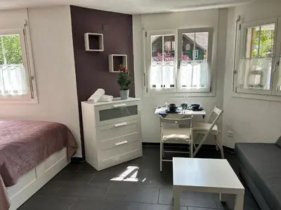 Ein Bett oder Betten in einem Zimmer der Unterkunft Studio Inferno Lauterbrunnen