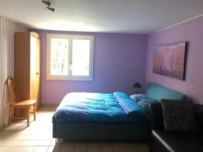 Ein Bett oder Betten in einem Zimmer der Unterkunft Domaine Bellevie BnB