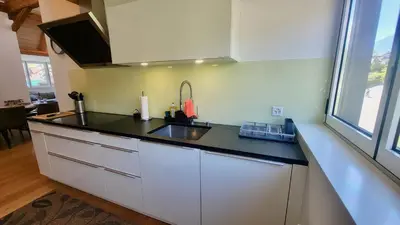 Küche/Küchenzeile in der Unterkunft Niesen Loft