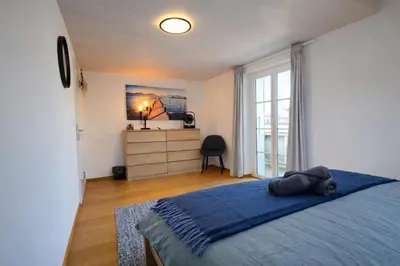 Ein Bett oder Betten in einem Zimmer der Unterkunft Niesen Loft