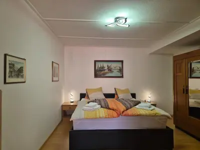 Ein Bett oder Betten in einem Zimmer der Unterkunft Chalet Aargovia South
