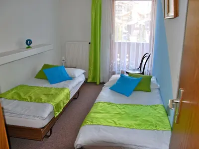 Ein Bett oder Betten in einem Zimmer der Unterkunft Apartment Aster by Interhome