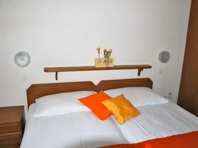 Ein Bett oder Betten in einem Zimmer der Unterkunft Apartment Aster by Interhome