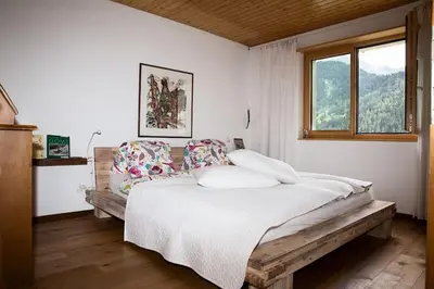Ein Bett oder Betten in einem Zimmer der Unterkunft Fiesch-Lax Minnig Moritz