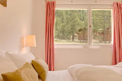 Ein Bett oder Betten in einem Zimmer der Unterkunft Apartment Windward