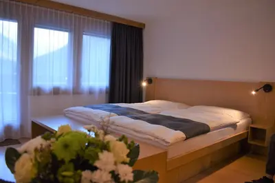 Ein Bett oder Betten in einem Zimmer der Unterkunft Appartementhaus Crystal