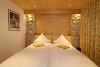 Ein Bett oder Betten in einem Zimmer der Unterkunft Ferienapartement Hinterdorf