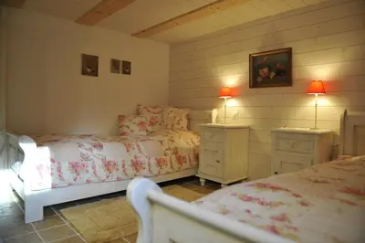 Ein Bett oder Betten in einem Zimmer der Unterkunft Chalet Nyati