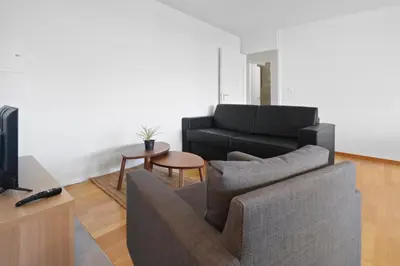 Ein Sitzbereich in der Unterkunft Appartement central et confortable