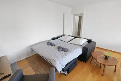 Ein Bett oder Betten in einem Zimmer der Unterkunft Appartement central et confortable