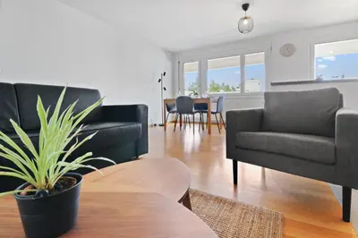 Ein Sitzbereich in der Unterkunft Appartement central et confortable