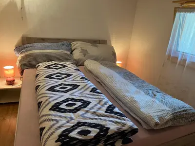 Ein Bett oder Betten in einem Zimmer der Unterkunft Historische Maisonette-Wohnung
