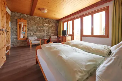 Ein Bett oder Betten in einem Zimmer der Unterkunft Hotel Waldhaus