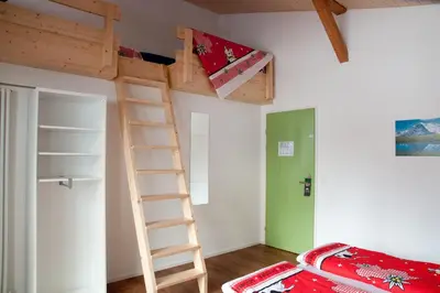 Ein Bett oder Betten in einem Zimmer der Unterkunft Valley Hostel