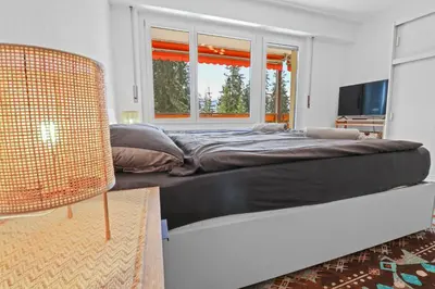 Ein Bett oder Betten in einem Zimmer der Unterkunft Studio paisible et chaleureux