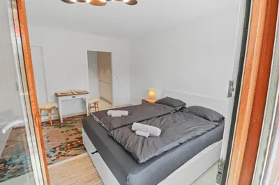 Ein Bett oder Betten in einem Zimmer der Unterkunft Studio paisible et chaleureux