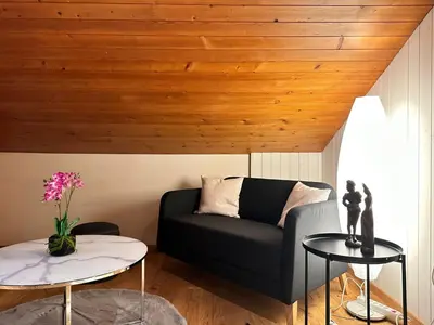 Ein Sitzbereich in der Unterkunft Alpina Appartment 2