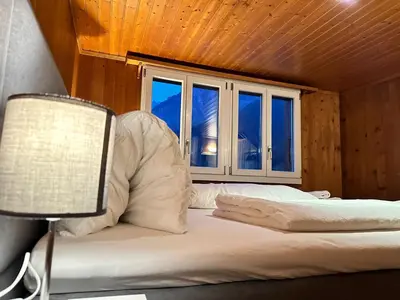 Ein Bett oder Betten in einem Zimmer der Unterkunft Alpina Appartment 2