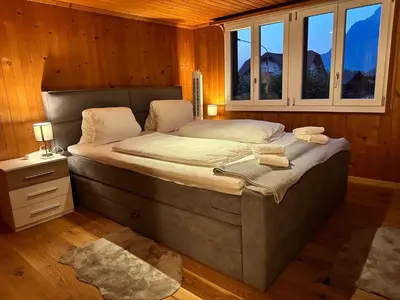 Ein Bett oder Betten in einem Zimmer der Unterkunft Alpina Appartment 2