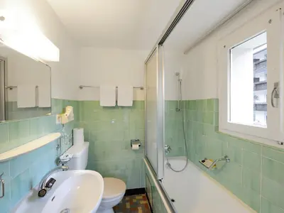 Ein Badezimmer in der Unterkunft Hotel Alphubel