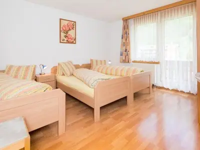 Ein Bett oder Betten in einem Zimmer der Unterkunft Apartment Amaryllis by Interhome