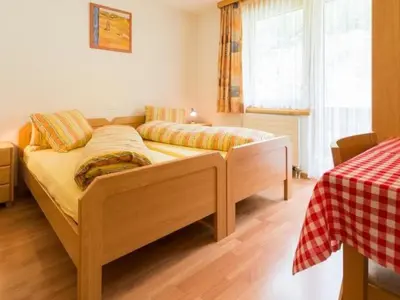 Ein Bett oder Betten in einem Zimmer der Unterkunft Apartment Amaryllis by Interhome