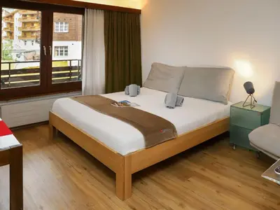 Ein Bett oder Betten in einem Zimmer der Unterkunft Apartment Pasadena-3 by Interhome