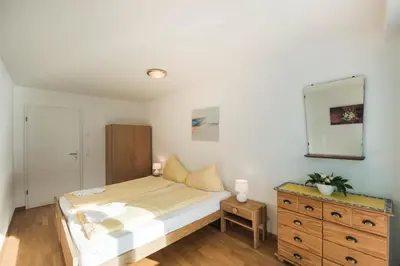Ein Bett oder Betten in einem Zimmer der Unterkunft Abendrot - Direct lake view