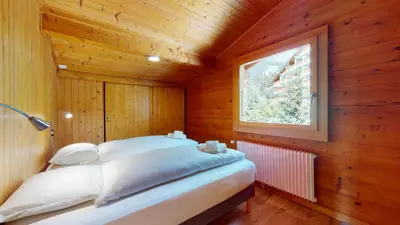 Ein Bett oder Betten in einem Zimmer der Unterkunft Apartment with spectacular view of the peaks