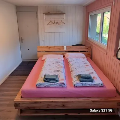 Ein Bett oder Betten in einem Zimmer der Unterkunft Mountain - Lake Apartment 3