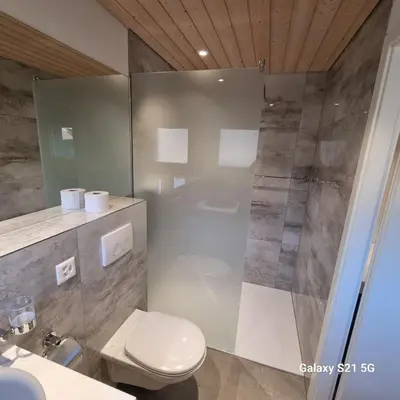 Ein Badezimmer in der Unterkunft Mountain - Lake Apartment 3
