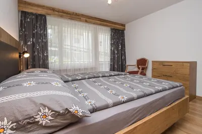 Ein Bett oder Betten in einem Zimmer der Unterkunft Haus Floralp