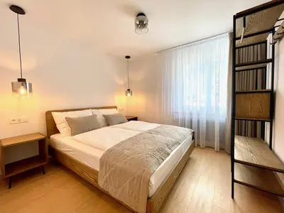 Ein Bett oder Betten in einem Zimmer der Unterkunft Azure Apartment