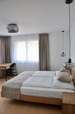 Ein Bett oder Betten in einem Zimmer der Unterkunft Azure Apartment