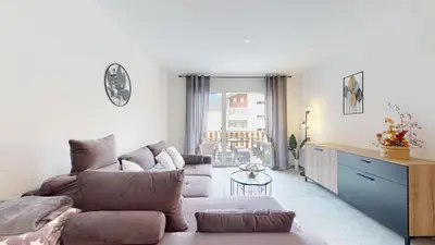 Ein Sitzbereich in der Unterkunft Apartment with sauna and mountain view