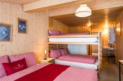Ein Bett oder Betten in einem Zimmer der Unterkunft Berghotel Distelboden