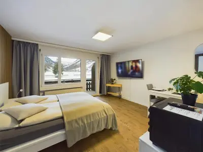 Ein Bett oder Betten in einem Zimmer der Unterkunft Panorama hideaway apartment near Zermatt with parking!