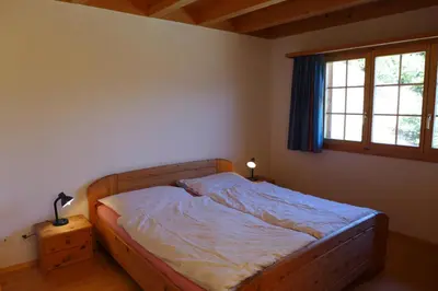 Ein Bett oder Betten in einem Zimmer der Unterkunft Wohnung mit 4 Schlafzimmer