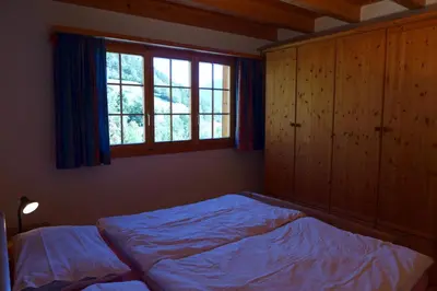 Ein Bett oder Betten in einem Zimmer der Unterkunft Wohnung mit 4 Schlafzimmer