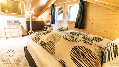 Ein Bett oder Betten in einem Zimmer der Unterkunft Chalet Eichhornli, Riederalp Golmenegg