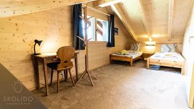 Ein Bett oder Betten in einem Zimmer der Unterkunft Chalet Eichhornli, Riederalp Golmenegg