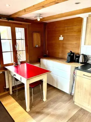 Küche/Küchenzeile in der Unterkunft Chalet Sonnenheim, Wohnung mit Panoramafenster