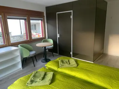 Ein Bett oder Betten in einem Zimmer der Unterkunft B&B Kalbermatter