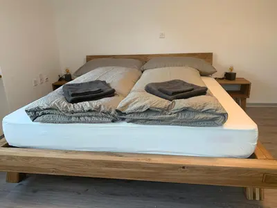 Ein Bett oder Betten in einem Zimmer der Unterkunft B&B Kalbermatter