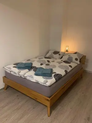 Ein Bett oder Betten in einem Zimmer der Unterkunft B&B Kalbermatter