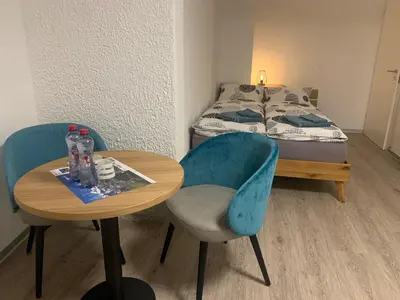 Ein Bett oder Betten in einem Zimmer der Unterkunft B&B Kalbermatter